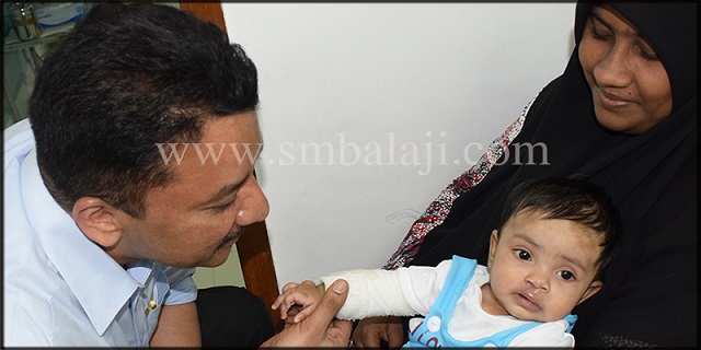 Dr S M Balaji with baby girl 15 days after surgery