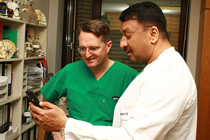 Prof Balaji With Prof Adolphs Viewing Memorabilia In Prof Adolphs Room