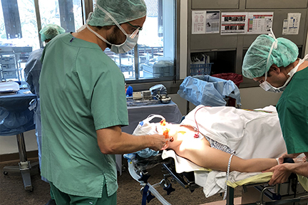 Anesthesiologist Intubating The Patient At The Charite Operating Room