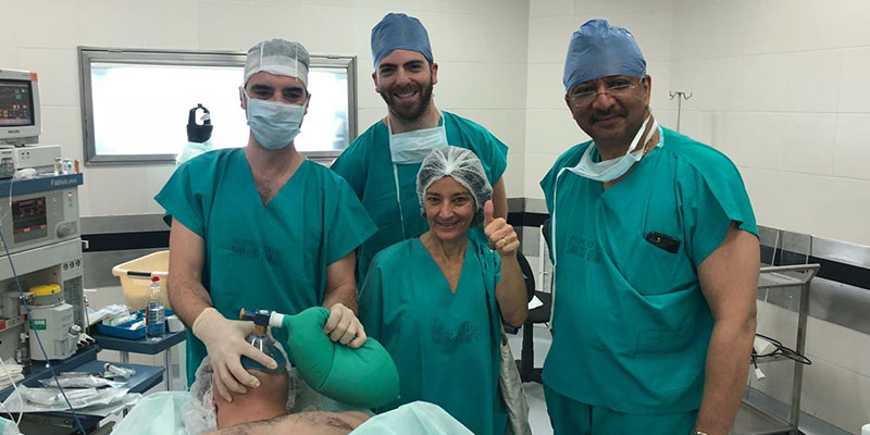 Prof SM Balaji in the operating room at Hospital Aleman with Dr Victoria Pezza and residents of the Department of Oral and Maxillofacial Surgery