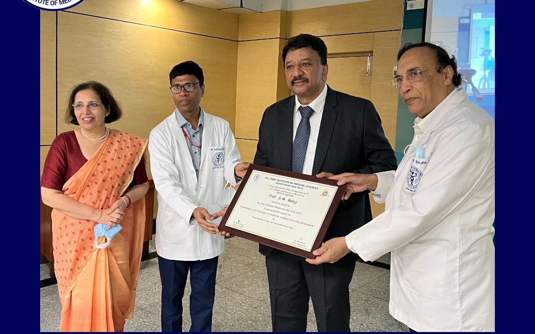 Dr SM Balaji receiving the certificate honouring him on the occasion of the oration